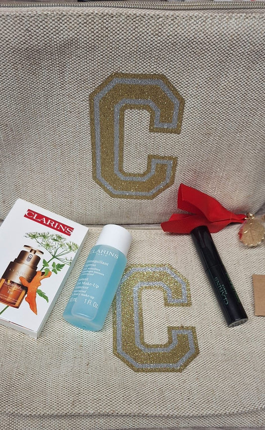 Pochett clarins + 3 prodotti