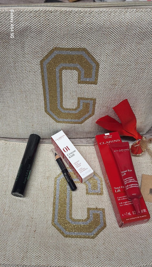 Pochett clarins + 3 prodotti