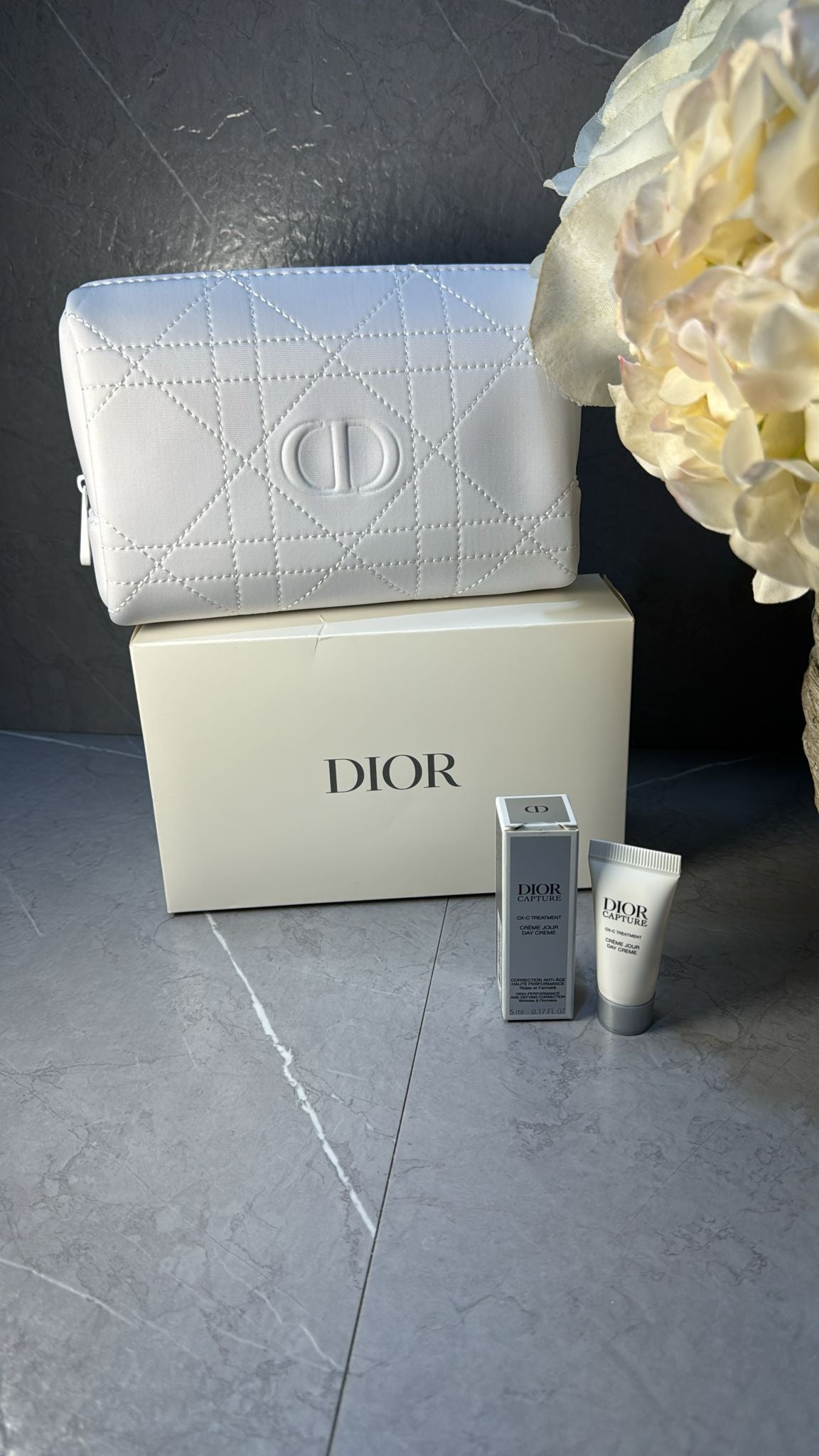 Borsello + crema viso